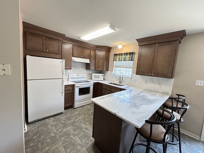 Building Photo - Spacious 2BR Town house in Houma Unit LABS 211 Greenbriar Dr - 60263840770