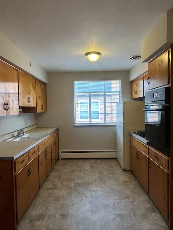 Building Photo - 6524 Glade Ave Unit Apt 3