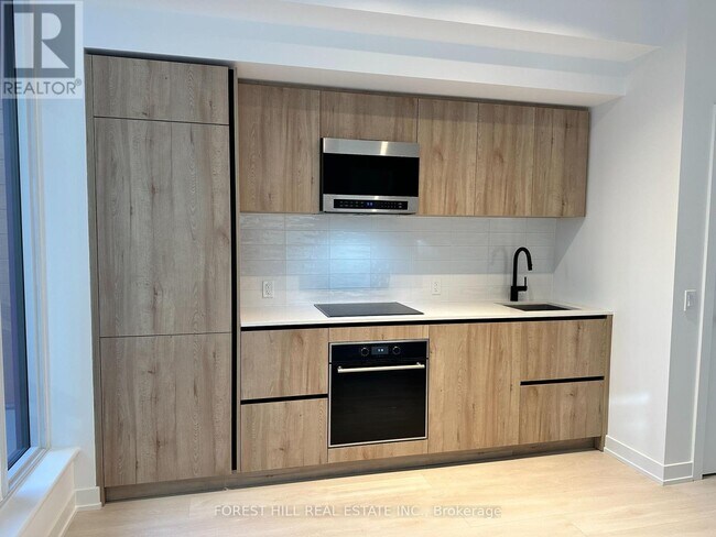 Photo - 117 Broadway Ave Unité 208