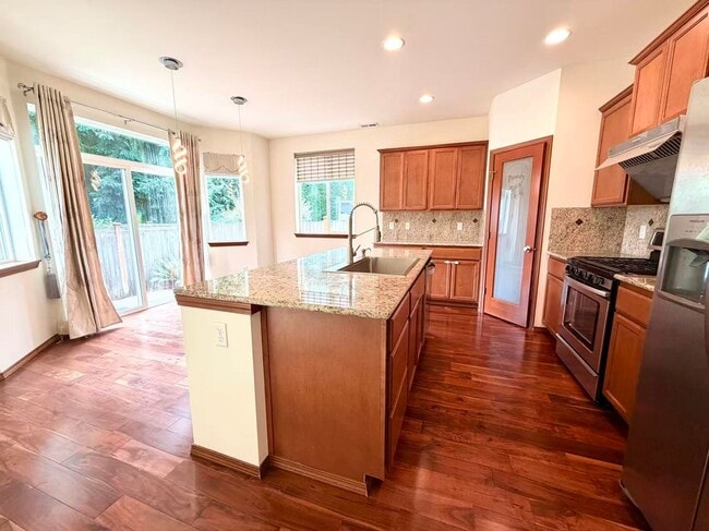 Photo - Stunning 4BR Woodmark Home with Office,A/C & Tesla Charger - Walk to Top Schools!