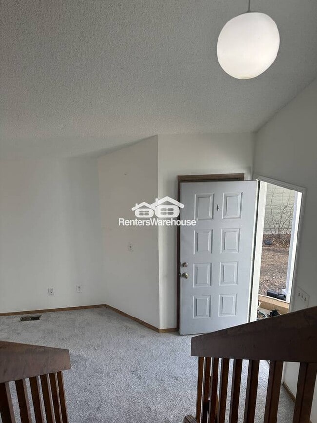 Photo - Bright living room, all stainless steel kitchen appliances, brand-new stove, washer and dryer, ne...