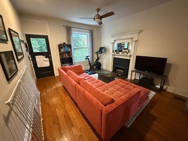 Photo - Remodeled 2 Bed / 2 Bath ½ Townhome | Private Rooftop Patio + Detached Garage |  Available Early ...