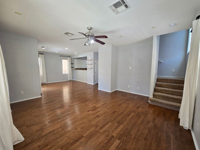 Photo - Step outside to a spacious, larger-than-average Las Vegas backyard complete with lush artificial ...