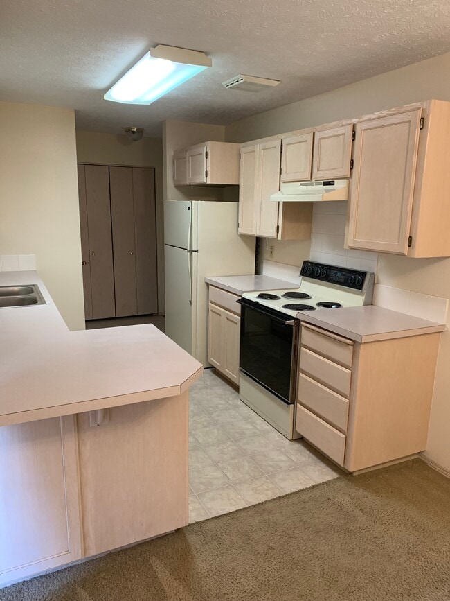 Photo - 3418 E 57th Ave