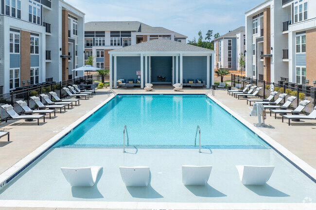 Outdoor Amenities Courtyard Pool - Medley at Northwood Landing Apartments