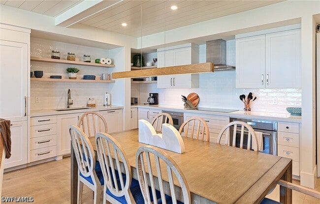 Photo - 265 Barefoot Beach Blvd Unit 203