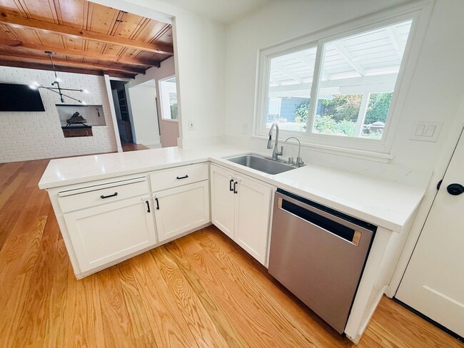 Photo - Corner lot 4-bedroom, 3-bathroom, 2,100 sq. ft. ranch-style home.  Great Location!