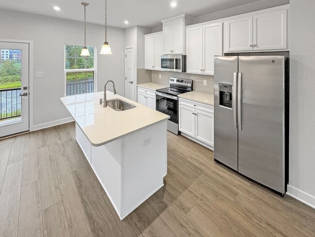 Photo - Spacious 3-Bedroom Townhome with Finished ...