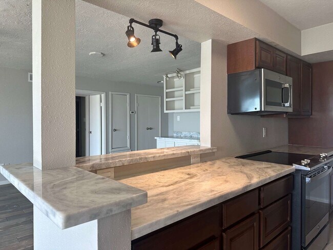 Building Photo - 500 Tiki Dr Unit 210