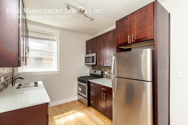 Building Photo - 3135 W Lawrence Ave Unit 3135-2