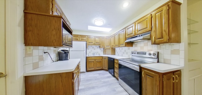 Building Photo - 3D Tour Available! West Side Home + Sunroom + Attached Garage + Pets Welcome + Washer & Dryer! A...
