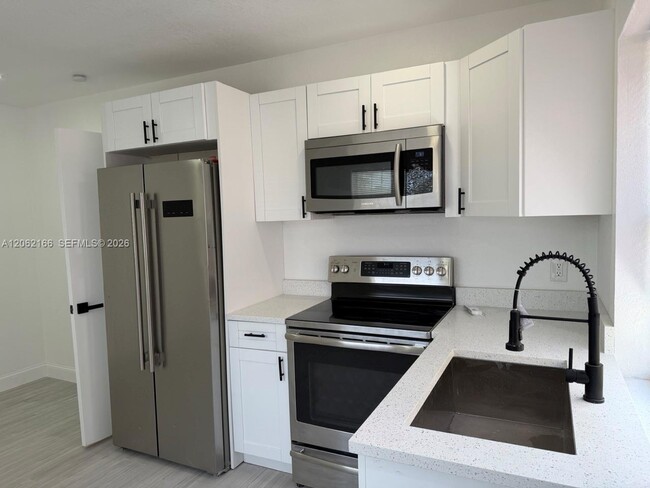 Building Photo - 7842 NW 5th Ave Unit FRONT