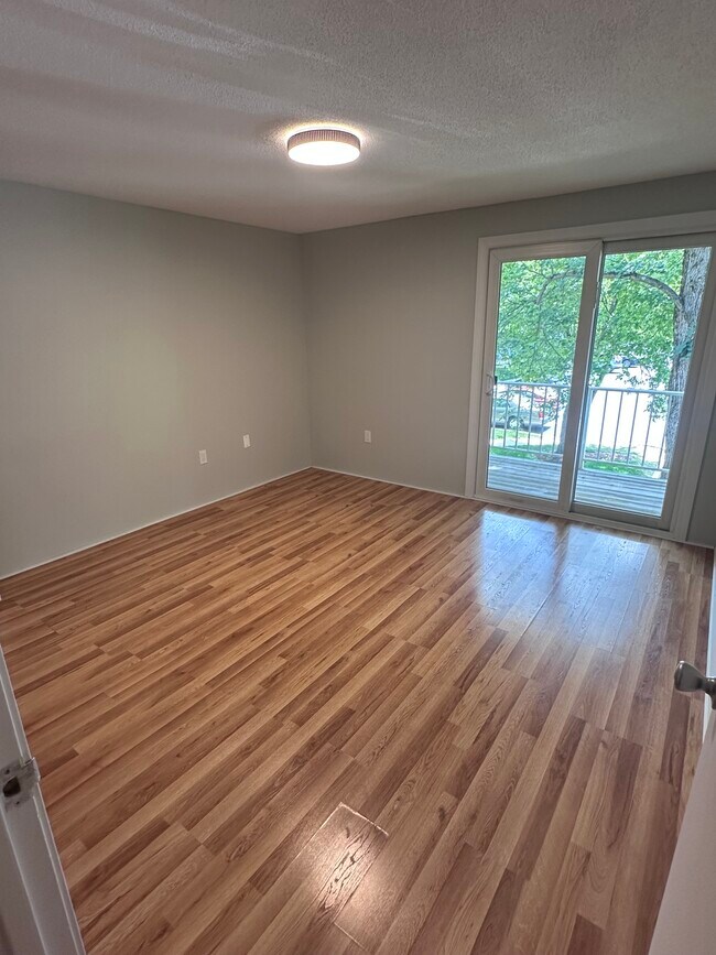 Bedroom with slider to balcony - 6 Walden Dr Unit #7