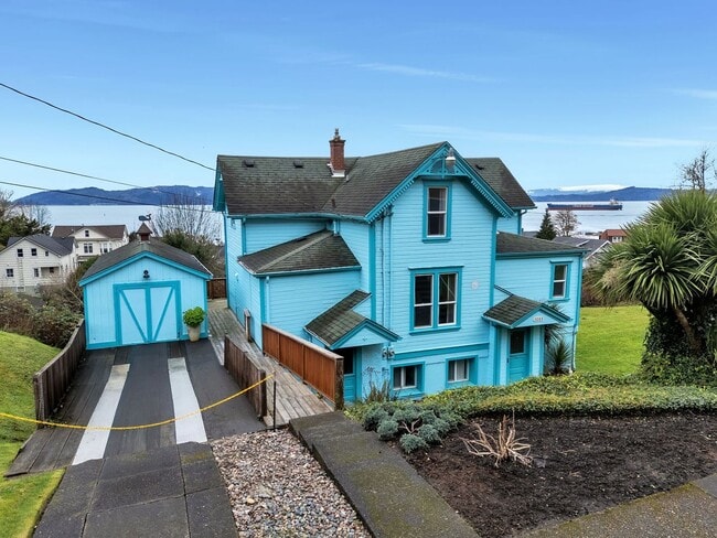 Building Photo - 3088 Harrison Ave Unit B / Upper