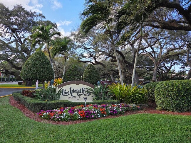 Building Photo - 1831 Sabal Palm Dr Unit 303