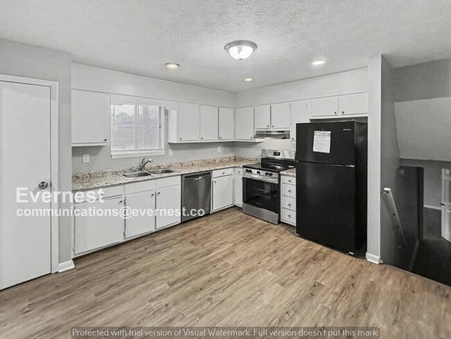 Photo - 4 Bed, 2 Bath Home with Garage / Pet-Friendly / Available Now!