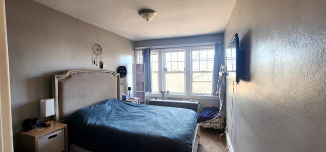 Bright and Airy Primary Bedroom - 822 E 4th St