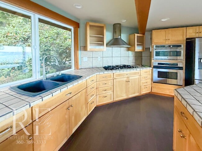 Photo - Waterfront Rustic Retreat with Vaulted Ceilings, Picture Windows & Lofted Nook