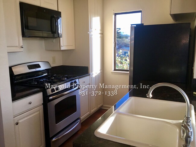 Photo - Charming Two-Story 2-Bed 2-Bath Home with Wrap-Around Balcony & Hardwood Floors in Seaside