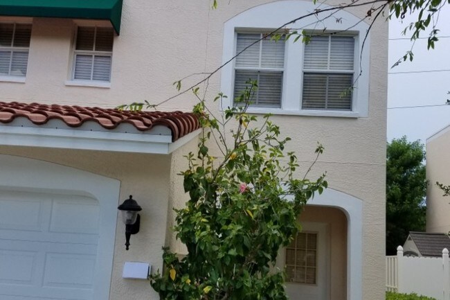 Front of Mediterranean Townhouse - 5678 Samter Ct