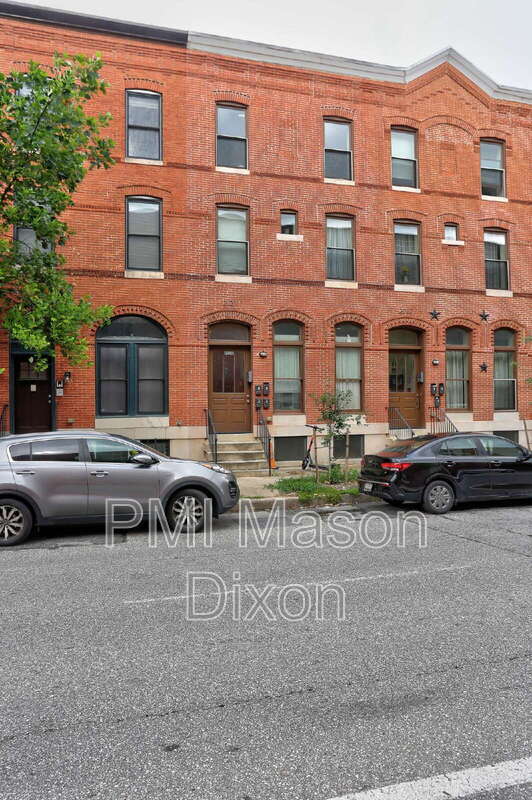 Building Photo - 2020 N Calvert St Unit C-1 Rental