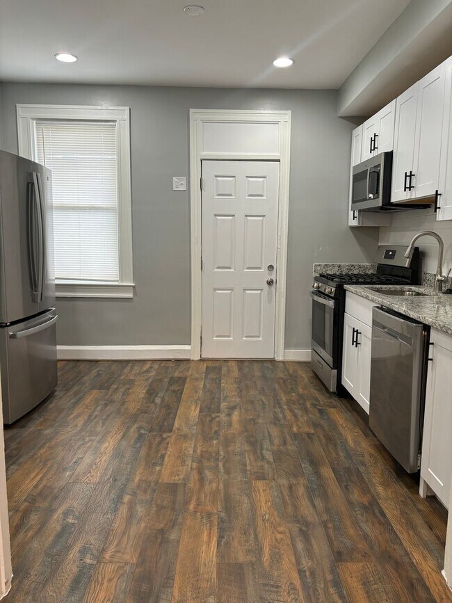 Photo - Beautifully Remodeled 2BR Home with Den an...