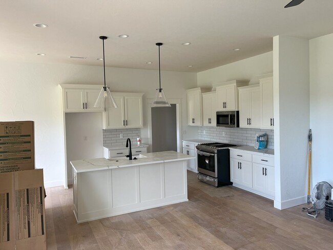 Photo - Beautiful BRAND-NEW 4 bedroom, 2 bath home on a cul-de-sac in the exclusive Lion's Gate neighborh...