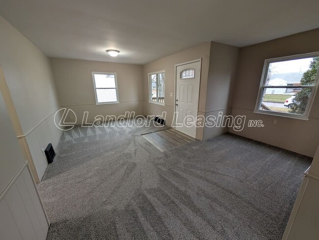 Photo - Updated Cape Cod with New Flooring, Front Deck & Garage