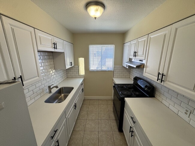Freshly Painted 2-Bed with Remodeled Kitchen & Open Layout