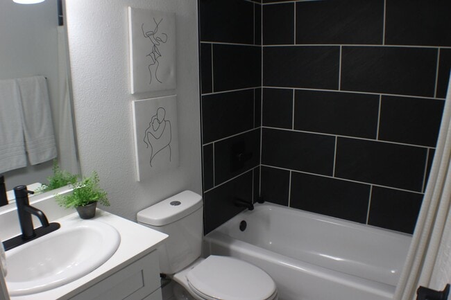 Photo - Renovated 2-Bedroom, 1.5-Bathroom Condo in South Bend – $1,435/Month – Accepting Section 8 (Lawn ...
