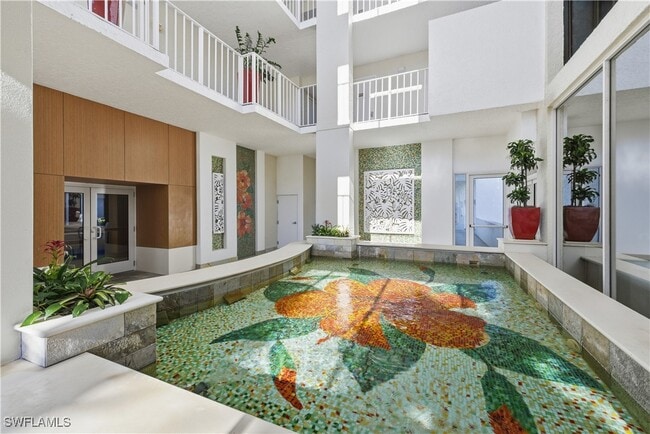 Building Photo - 6361 Pelican Bay Blvd Unit 802