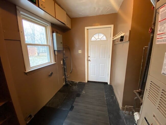 Photo - One-Floor 3BR Ranch + Screened Porch + Oversized Garage Space!