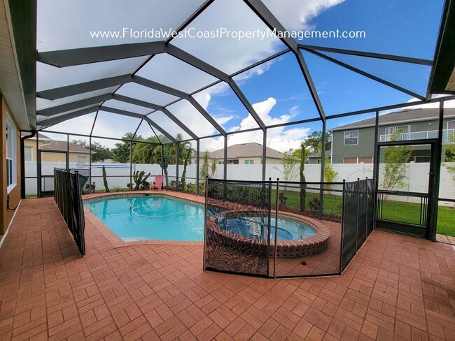 Photo - LARGE PARRISH POOL HOME! FENCED YARD! PET FRIENDLY! AVAILABLE FOR JUNE! LONG TERM LEASE!