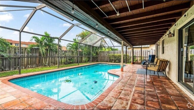 Building Photo - 9510 NW 31st Pl Rental