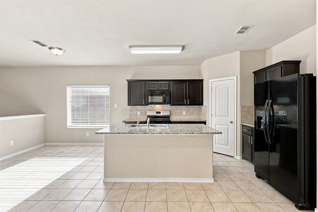 Photo - 612 River Rock Rd