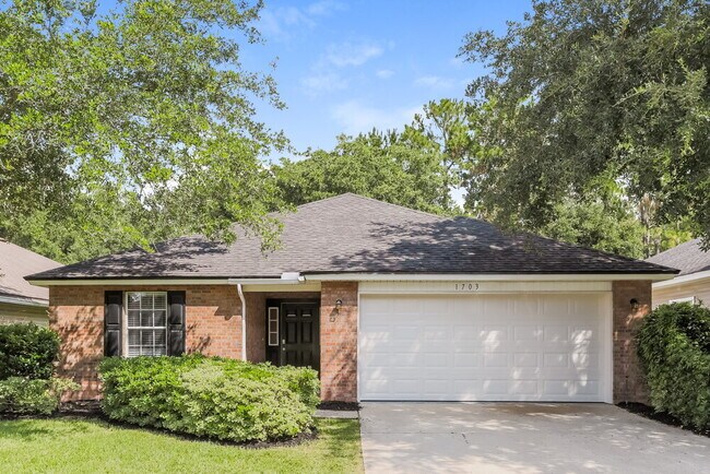 Photo - 1703 Canopy Oaks Dr House