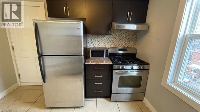 Photo - 1544 King St E Unité 406