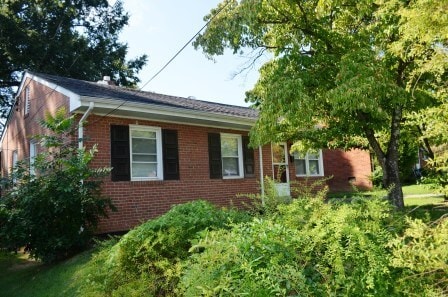 Building Photo - 3 BR/ 1 BA Lakeside Three bedroom with large fenced yard and detached garage/workshop