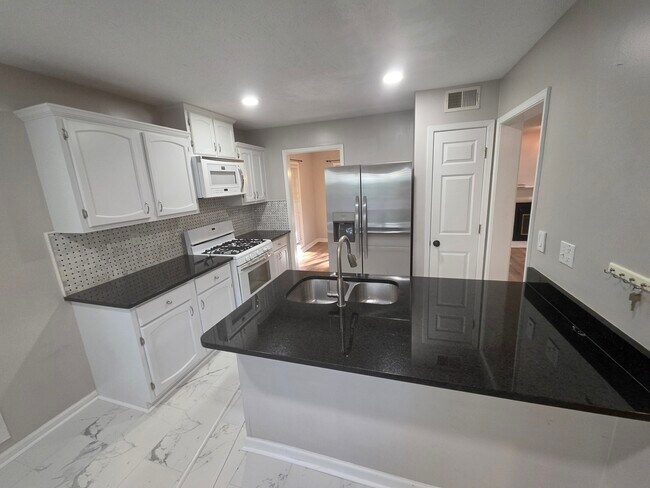 Photo - 1266 Weatherstone Dr NE Unit Condo