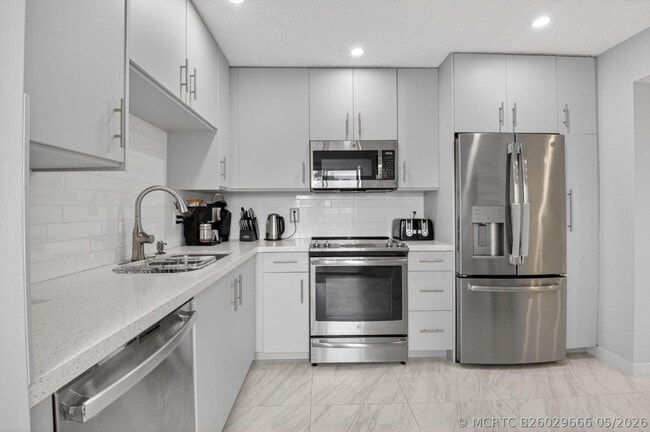 Building Photo - 7563 Glendevon Ln Unit 1306