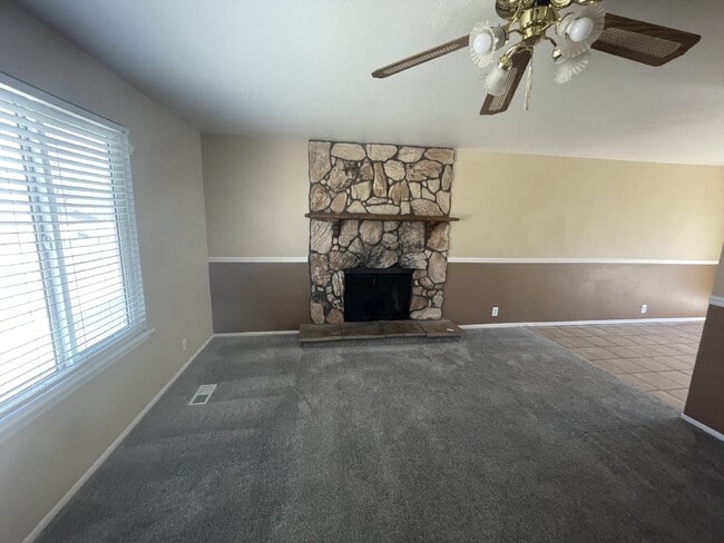 Photo - Spacious 6-Bed Oasis with Finished Basement & Cozy Fireplace.