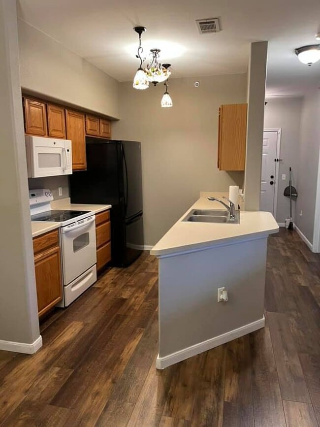 Photo - Great 2 bedroom/2bath condo- 3rd floor with loft! 1 car garage! Flexible Move in Date! -$250 off ... Unit C36