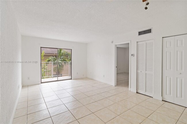 Photo - 1095 W 77th St Apartment Unit 111