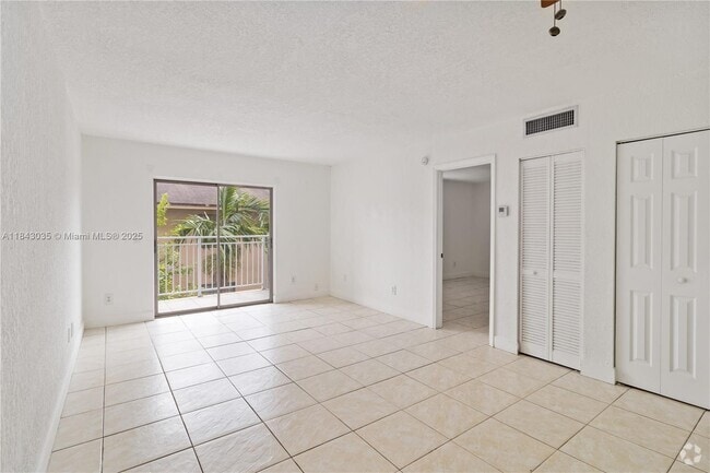 Building Photo - 1095 W 77th St Unit 111 Rental