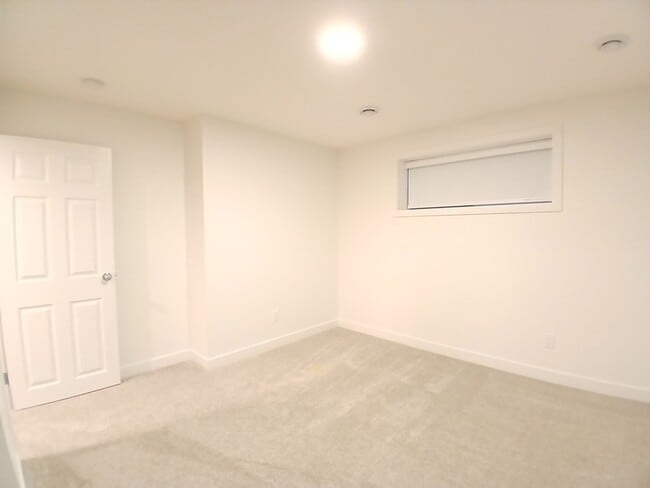 Building Photo - 5100 River’s Edge Wy NW Unit Lower