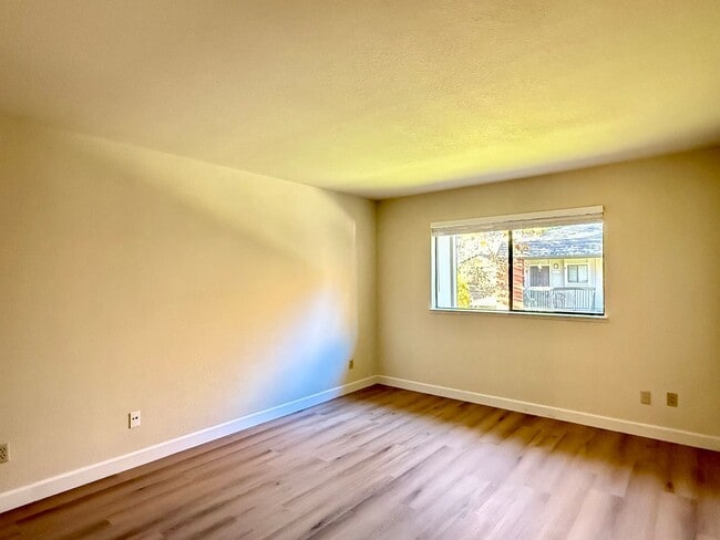 Photo - New Vinyl Plank Flooring, Fresh Interior Paint, 1 Car Garage + 1 Assigned Outdoor Parking Space -...
