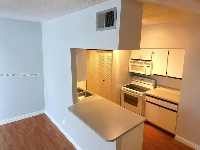 Building Photo - 18338 NW 68th Ave Unit D