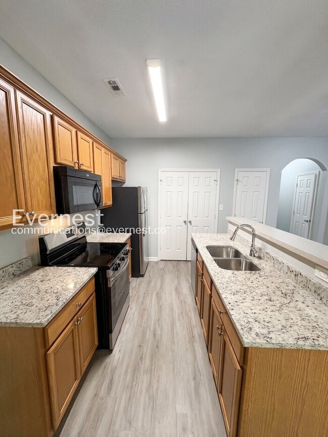 Photo - 3 Bed, 2 Bath Home with Garage / Pet-Friendly / Available Now!