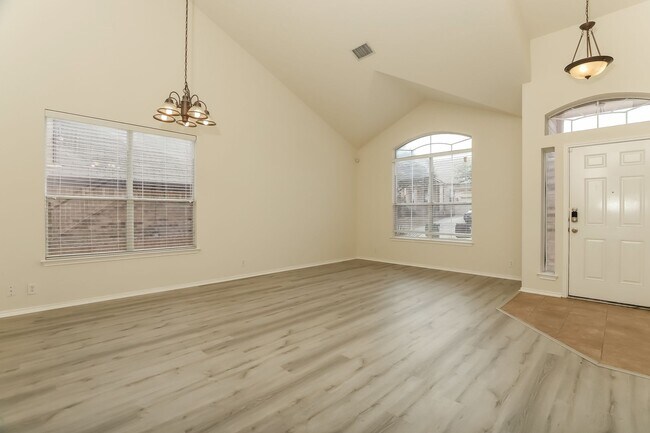 Photo - Spacious & Sun-Filled 4BR Retreat with Open-Concept Living and Versatile Dual Living Areas