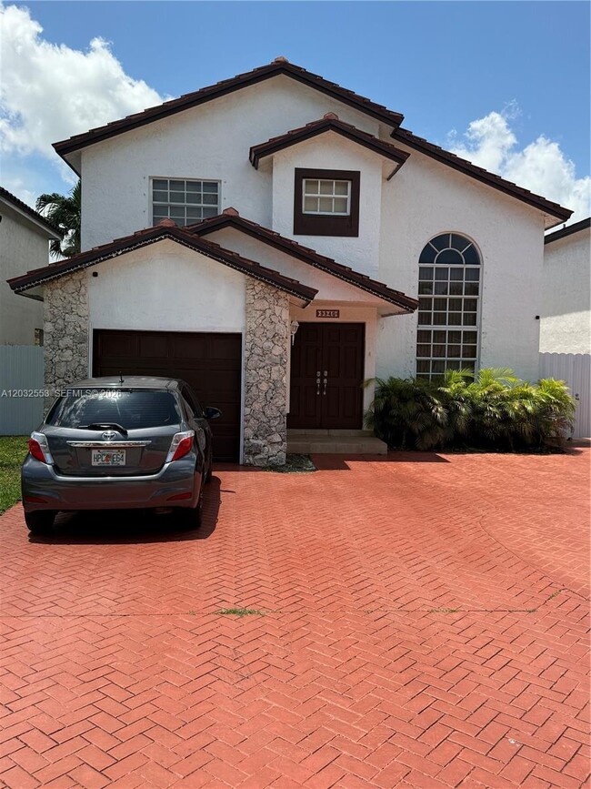 Building Photo - 9940 SW 146th Ct